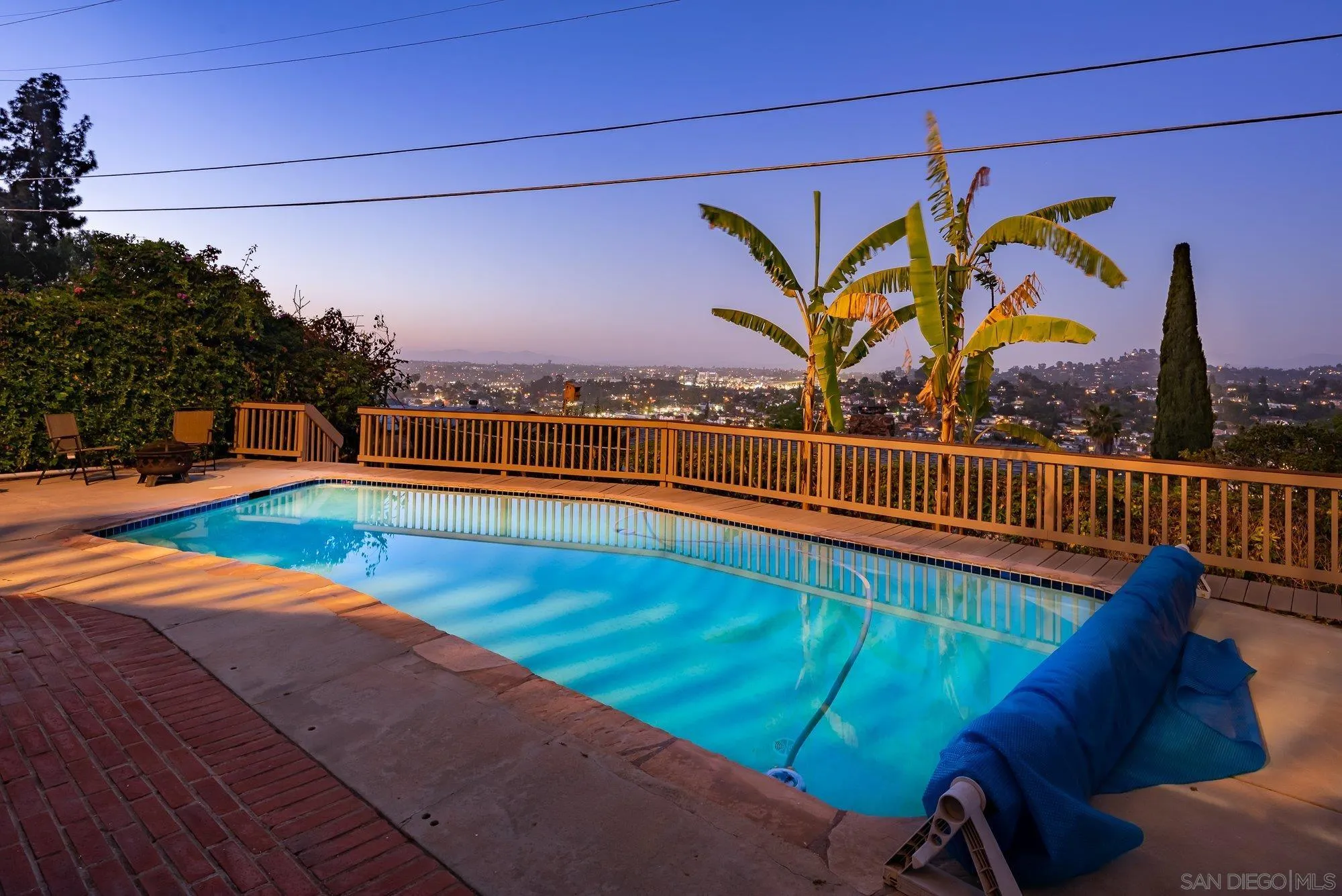 4361 Valle Drive La Mesa, CA 91941 - Photo 47 of 67 a view of a swimming pool with a lounge chairs