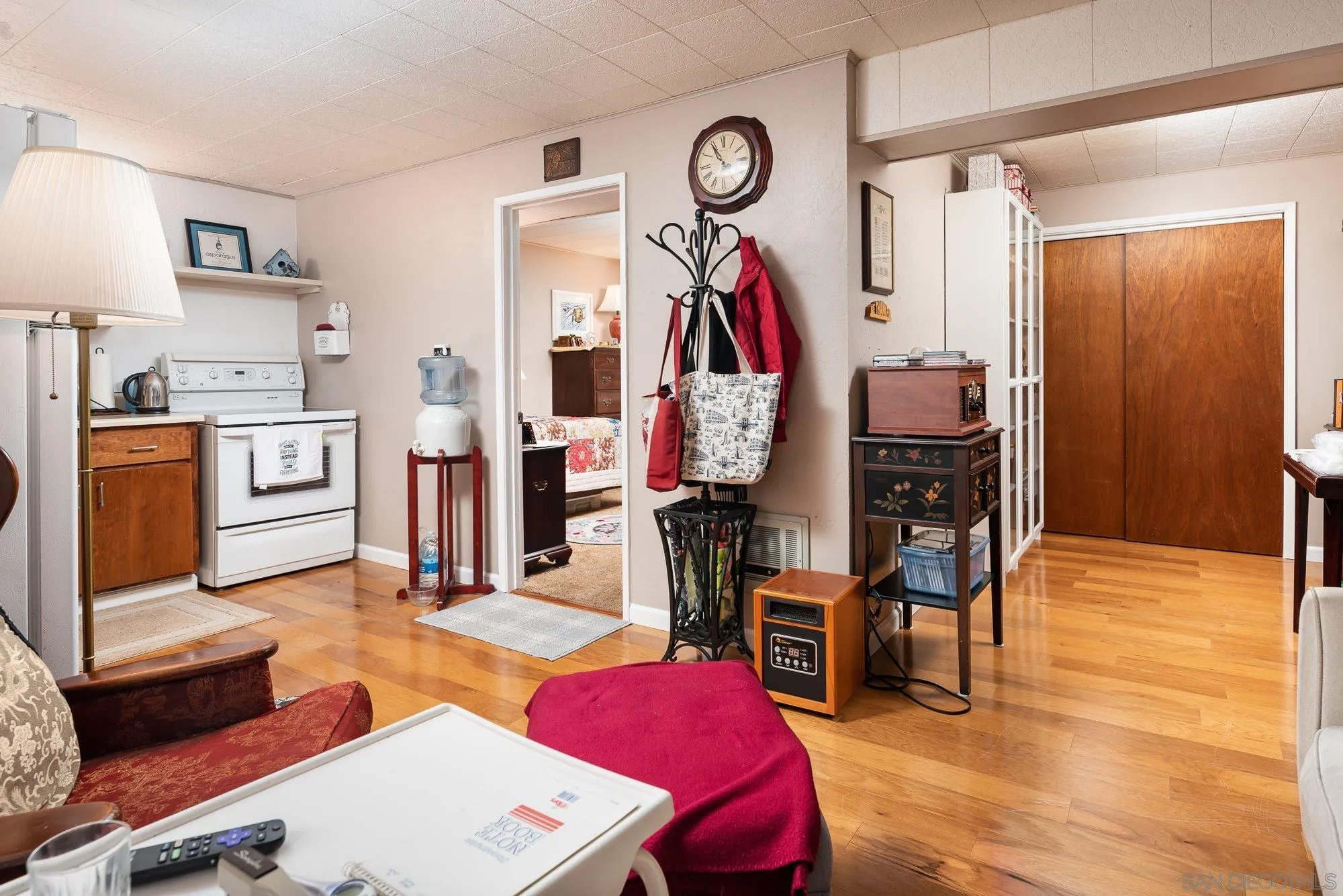 4361 Valle Drive La Mesa, CA 91941 - Photo 58 of 67 a living room with furniture a flat screen tv and a dining table