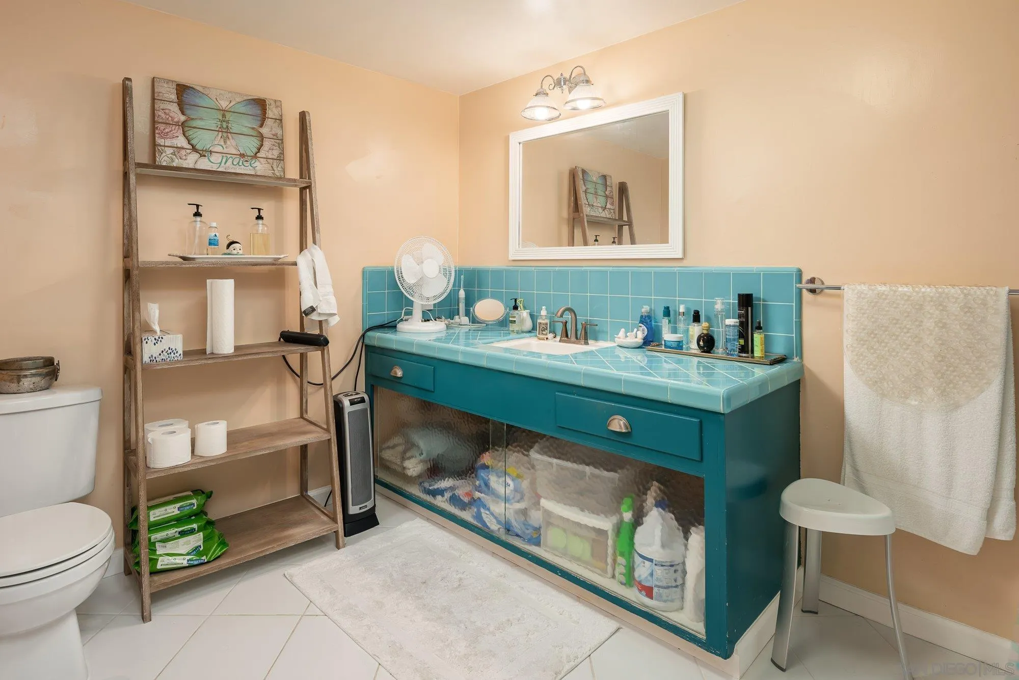 4361 Valle Drive La Mesa, CA 91941 - Photo 61 of 67 a bathroom with a sink toilet and mirror