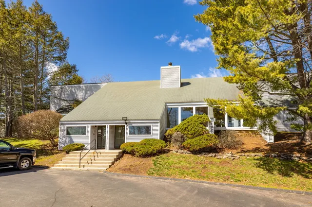 a view of a house with a patio