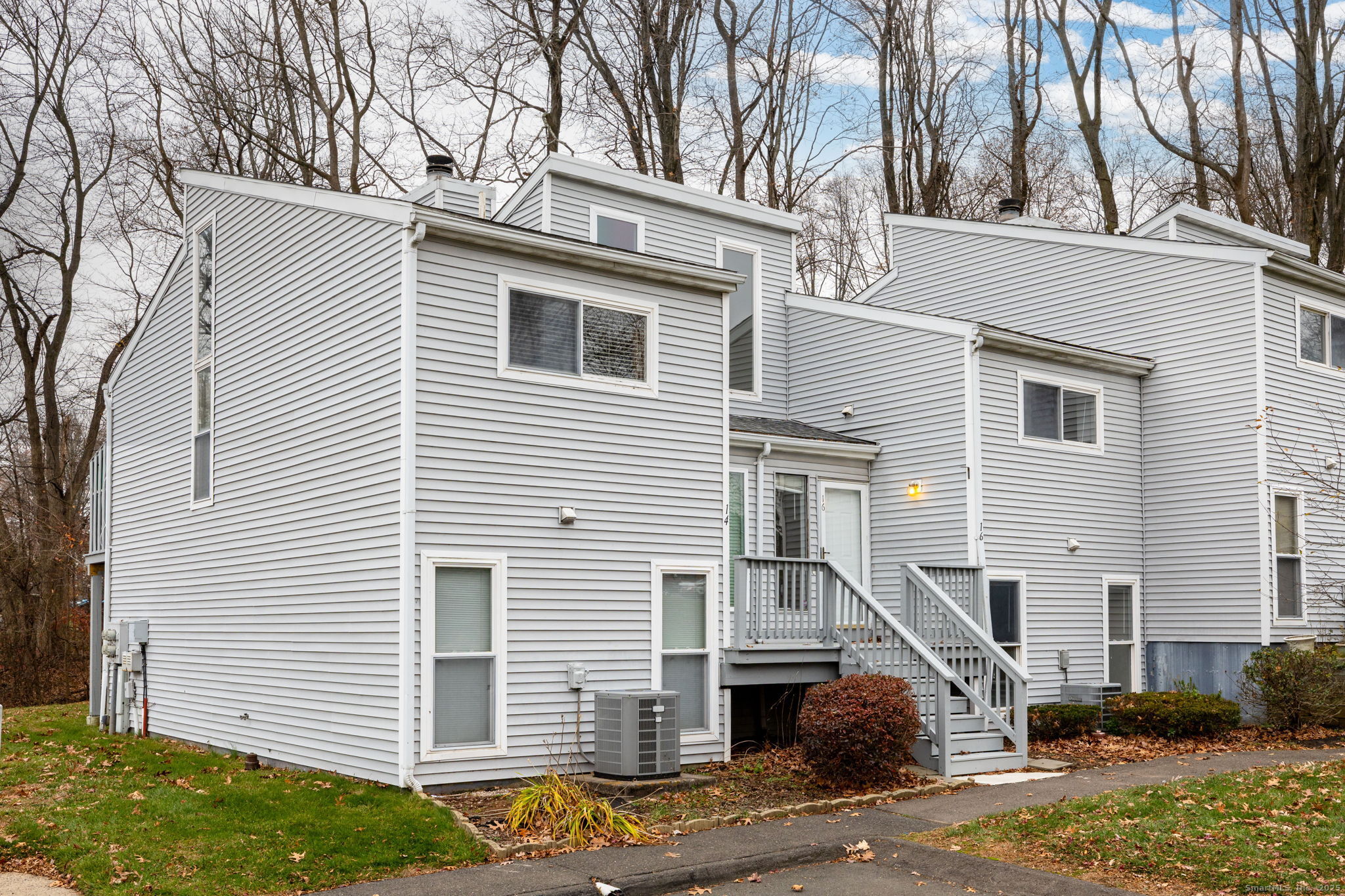 16 Springdale Road, Unit 16 Cromwell, CT 06416 - Photo 28 of 36 a view of a house with a yard