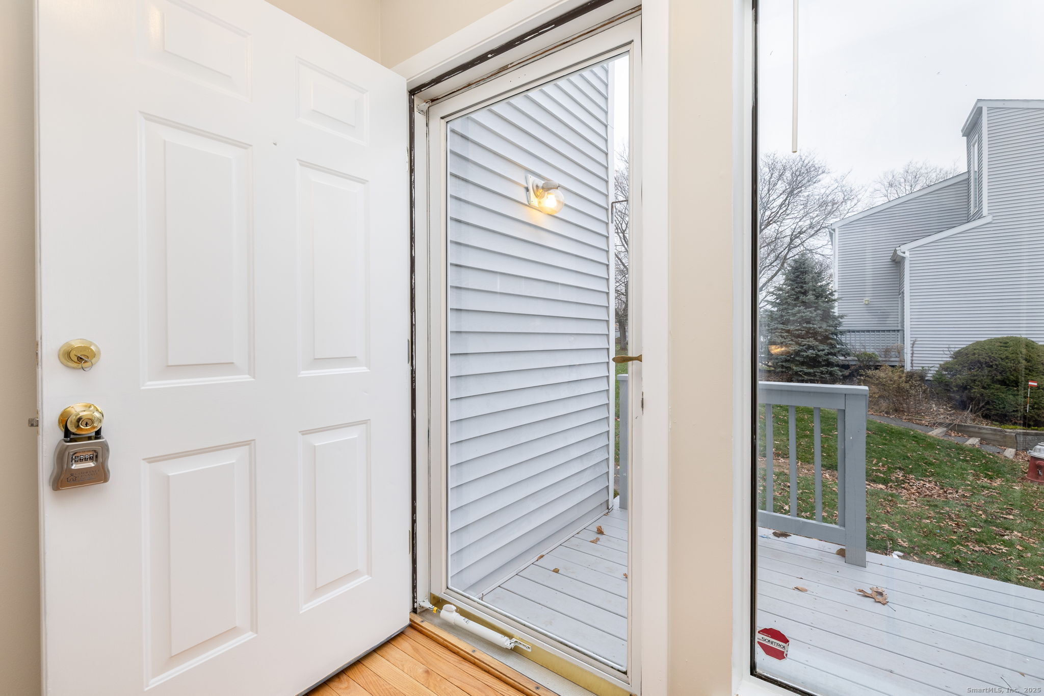 16 Springdale Road, Unit 16 Cromwell, CT 06416 - Photo 3 of 36 a view of a door and chair in front of a door