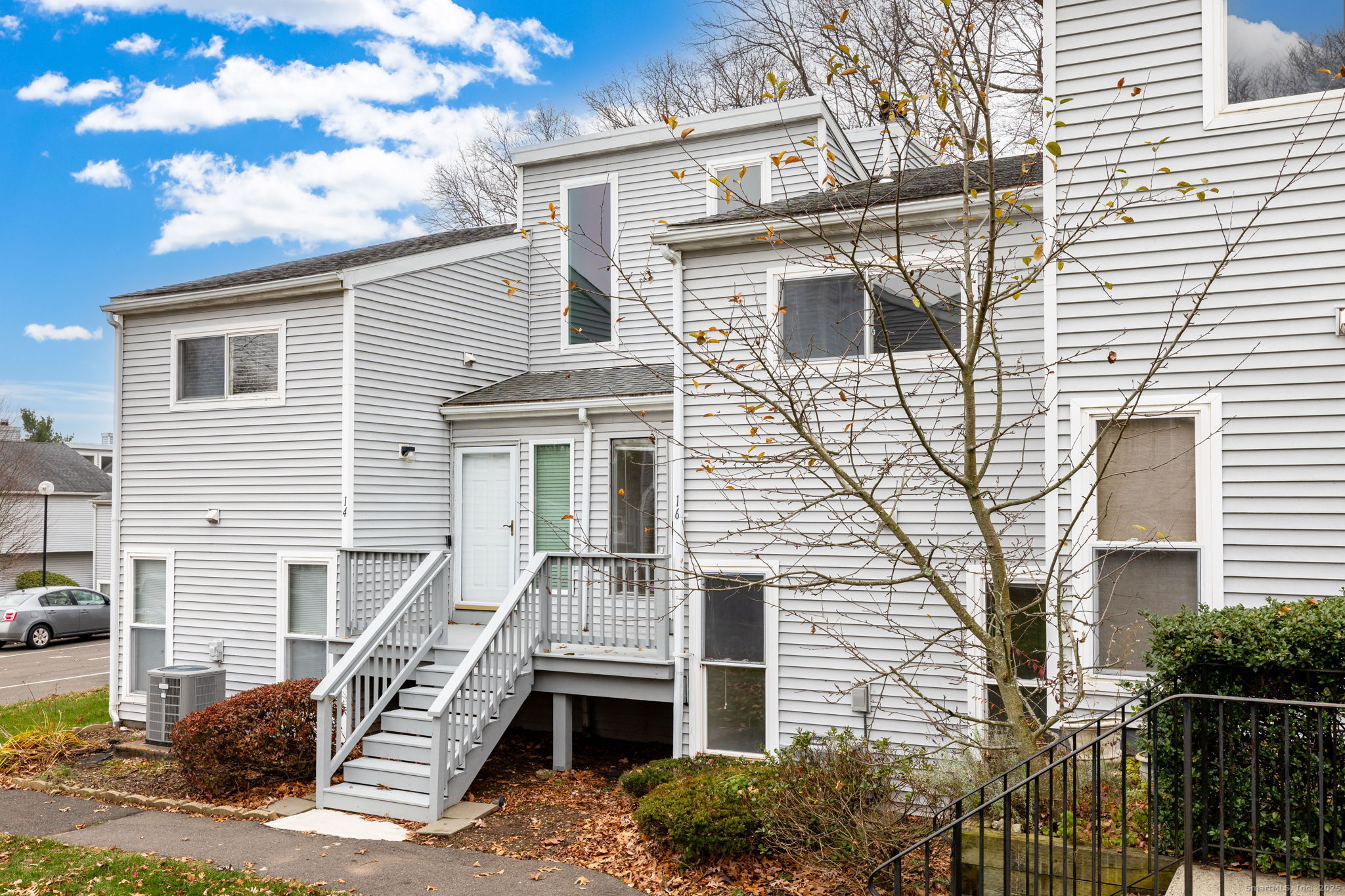 16 Springdale Road, Unit 16 Cromwell, CT 06416 - Photo 31 of 36 a front view of a house with stairs
