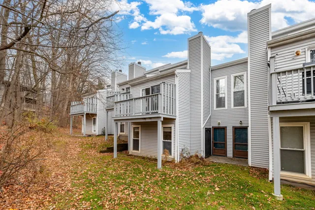 a front view of a house with yard