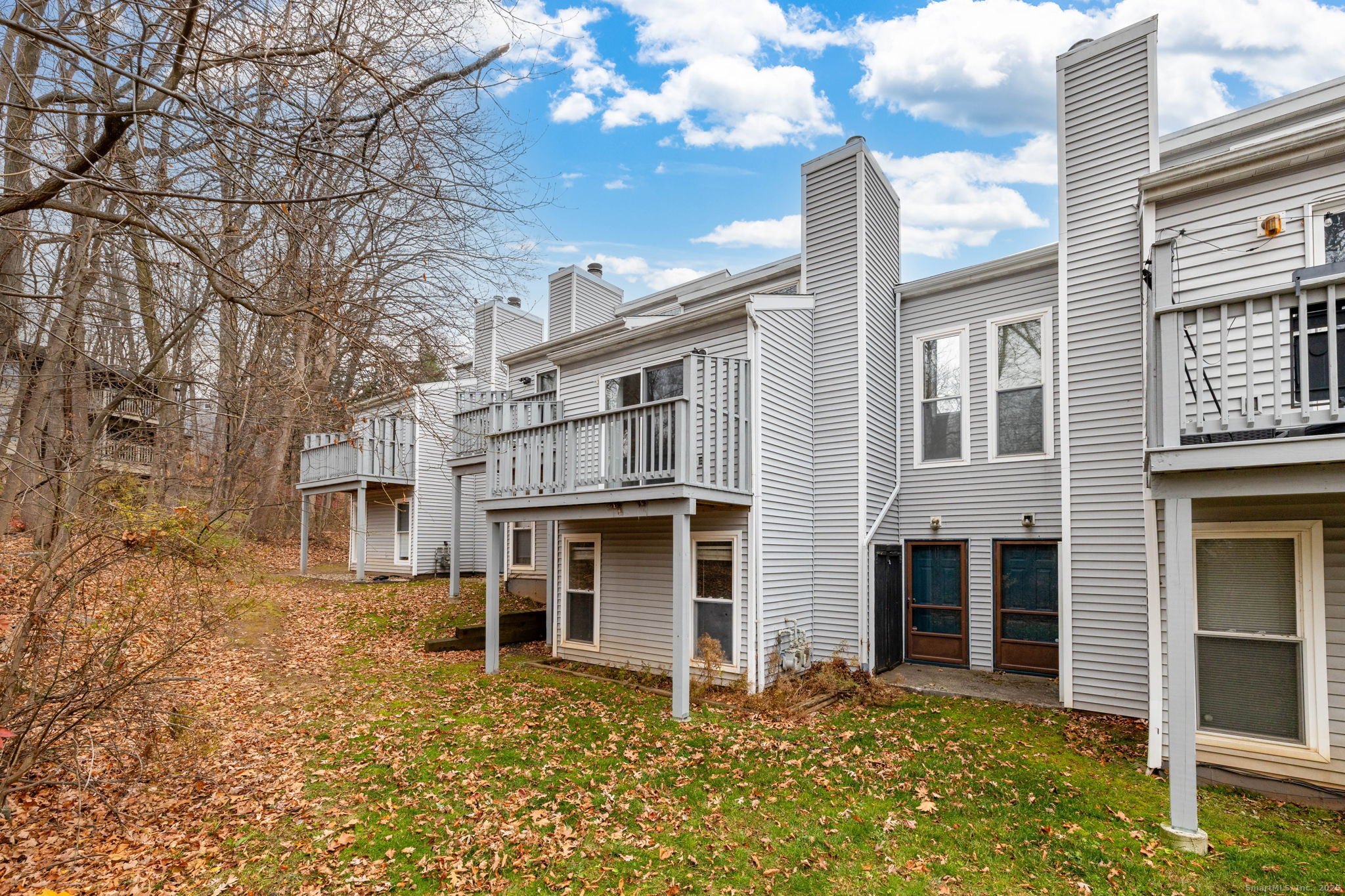 16 Springdale Road, Unit 16 Cromwell, CT 06416 - Photo 32 of 36 a front view of a house with yard