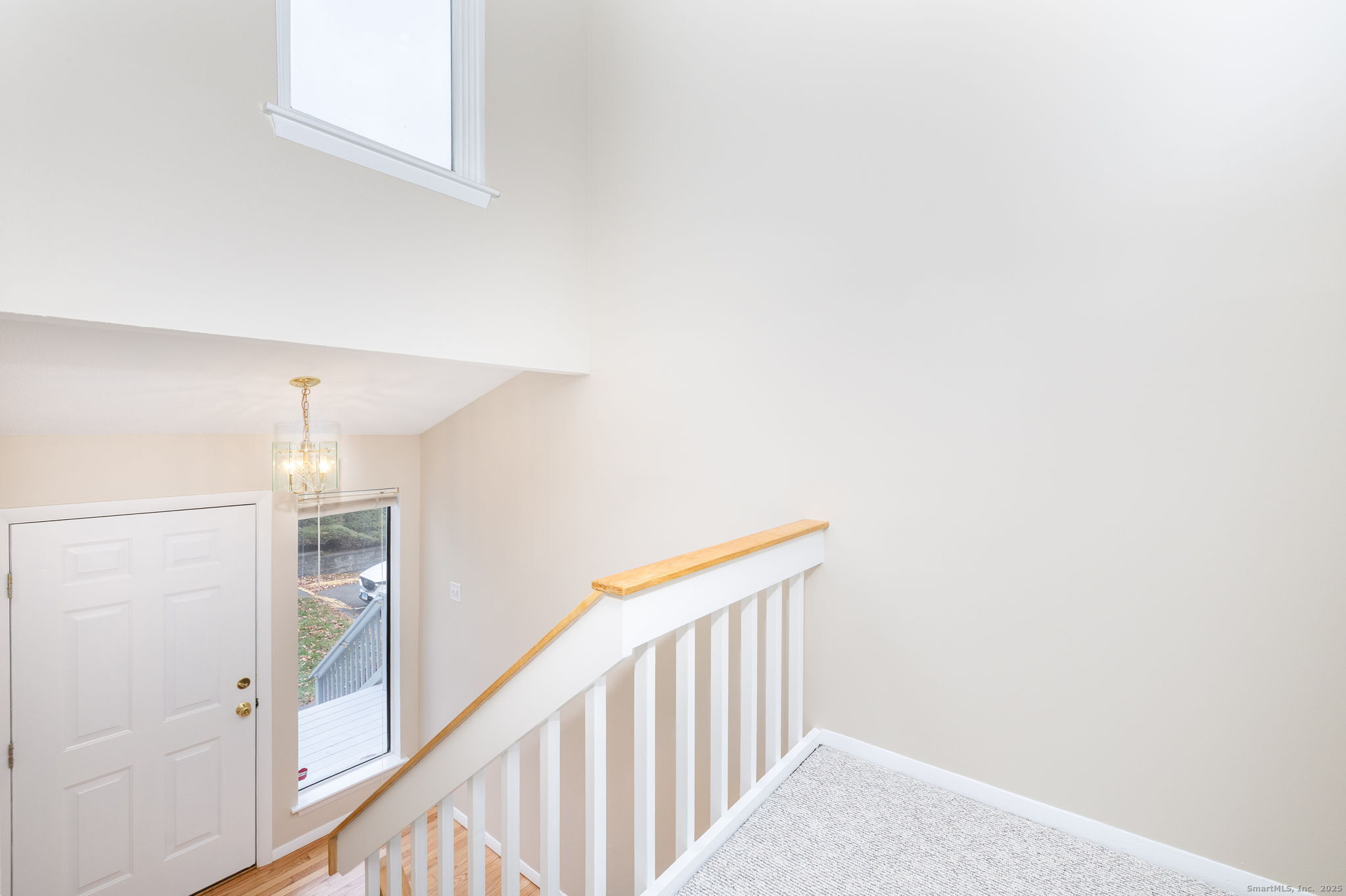 16 Springdale Road, Unit 16 Cromwell, CT 06416 - Photo 5 of 36 a view of a hallway with staircase