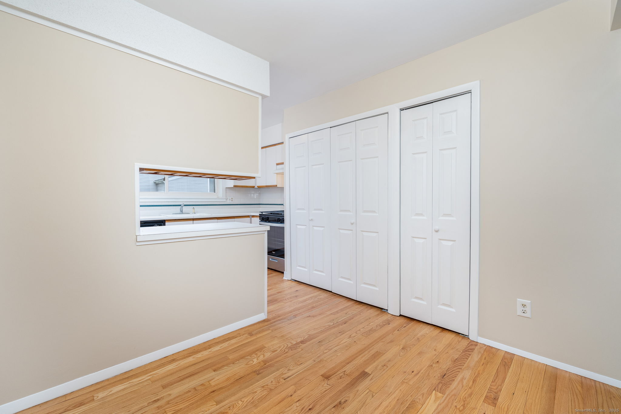 16 Springdale Road, Unit 16 Cromwell, CT 06416 - Photo 9 of 36 a view of a kitchen with wooden floor