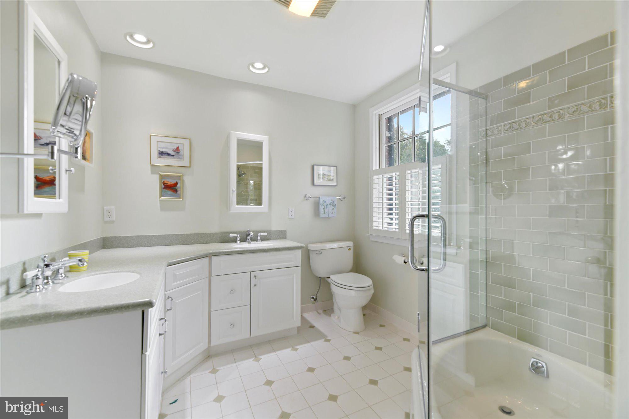 102 Castlewood Road Baltimore, MD 21210 - Photo 41 of 74 Primary bathroom is bright and beautiful