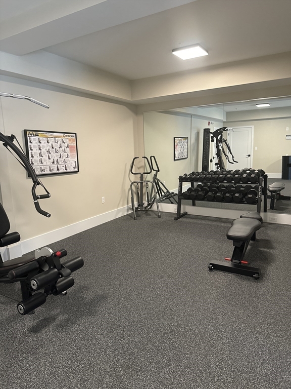 23 Prentice Street, Unit 2205 Grafton, MA 01536 - Photo 8 of 8 a view of a room with gym equipment