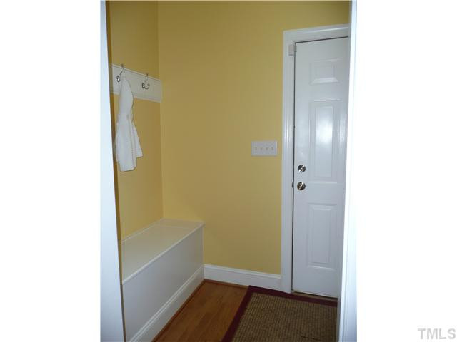 5224 Indigo Moon Way Raleigh, NC 27613 - Photo 10 of 25 Mud room is located off the garage and features, storage bench, coat hooks and calendar/bulletin board area to manage the family schedule. Other