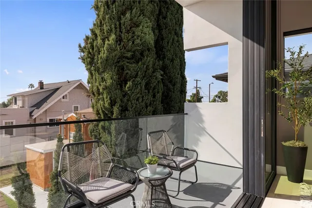 a bathroom with a sink a mirror and vanity