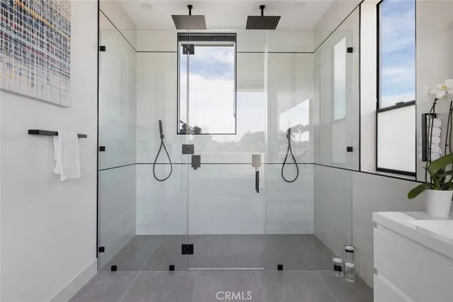 a living room with furniture wooden floor and city view