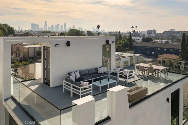a kitchen with a table and chairs