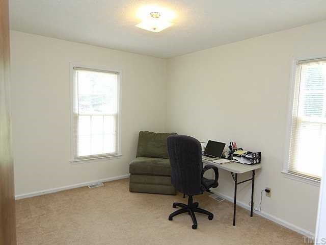 5290 Hurdle Mills Road Roxboro, NC 27574 - Photo 11 of 25 Bedroom three is ready to be used as a bedroom or study.