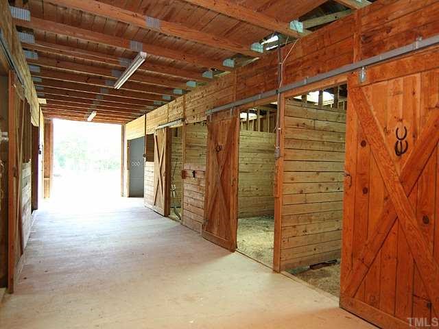 5290 Hurdle Mills Road Roxboro, NC 27574 - Photo 18 of 25 Larger barn is in great condition.