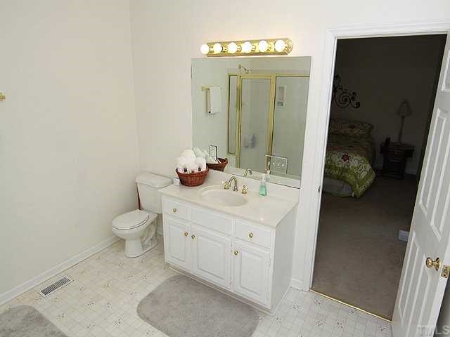 5290 Hurdle Mills Road Roxboro, NC 27574 - Photo 7 of 25 Very bright master bath with shower and tub.