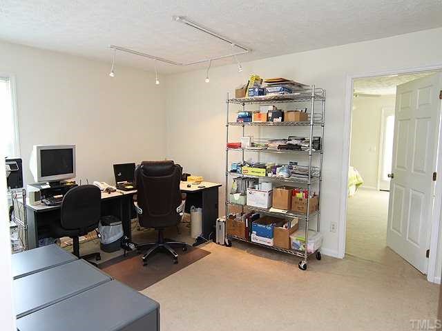 5290 Hurdle Mills Road Roxboro, NC 27574 - Photo 9 of 25 Office/exercise room/den right off the master bedroom has its own bathroom.