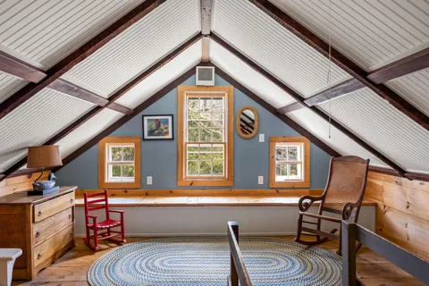 a view of a room with a large window