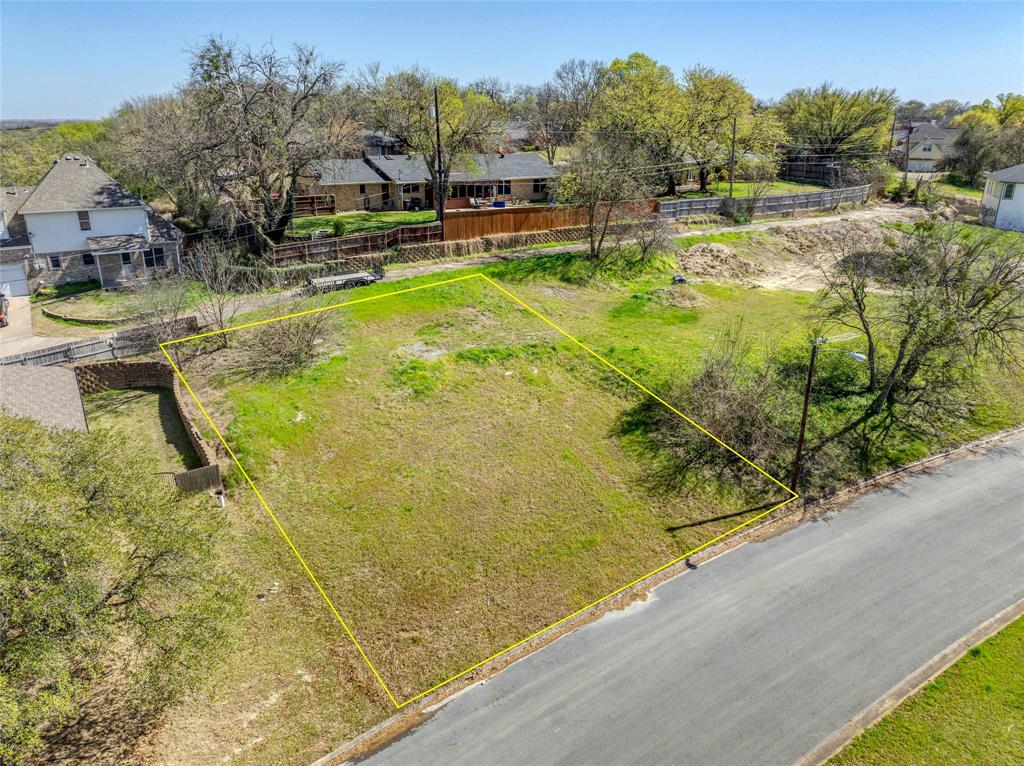 317 Arapaho W Road Sherman, TX 75092 - Photo 2 of 8 a view of swimming pool with lawn chairs and plants