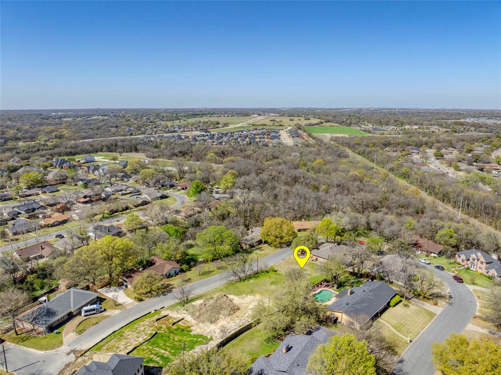 317 Arapaho W Road Sherman, TX 75092 - Photo 4 of 8 an aerial view of a city