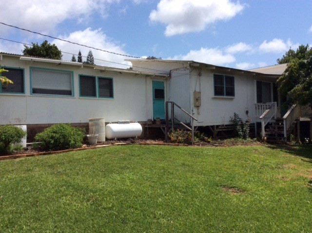 Lae Road Kalaheo, HI 96741 - Photo 1 of 17 a view of a backyard with plants and a patio