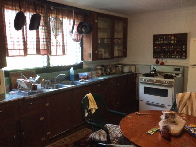 Lae Road Kalaheo, HI 96741 - Photo 4 of 17 a kitchen with a sink and a stove