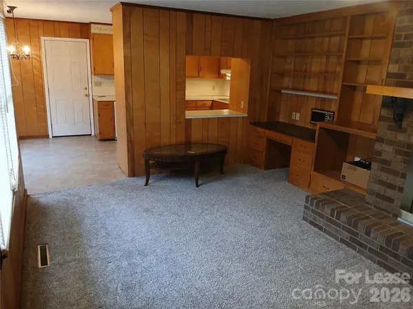 a kitchen with a sink and a refrigerator