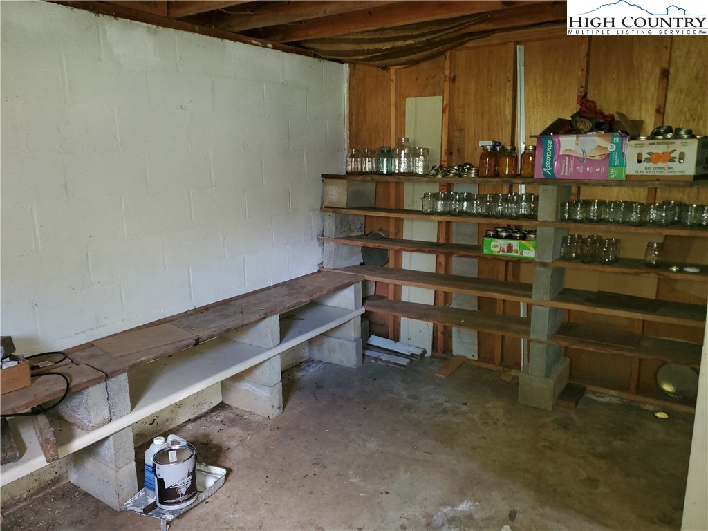 1411 Cabbage Creek Road Creston, NC 28615 - Photo 19 of 41 a room with storage and utility