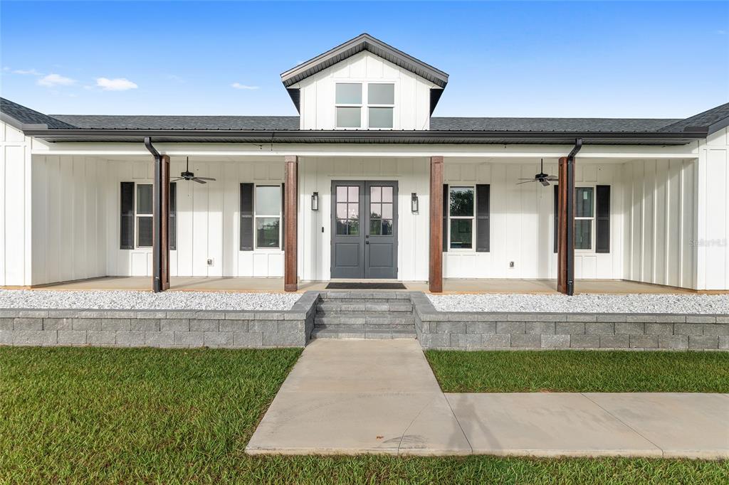 15224 Northwest 56th Court Road Reddick, FL 32686 - Photo 12 of 50 front view of a house