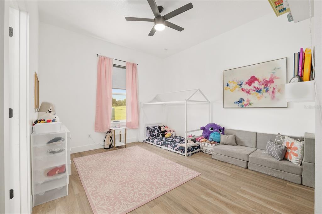 15224 Northwest 56th Court Road Reddick, FL 32686 - Photo 43 of 50 a living room with furniture and a window