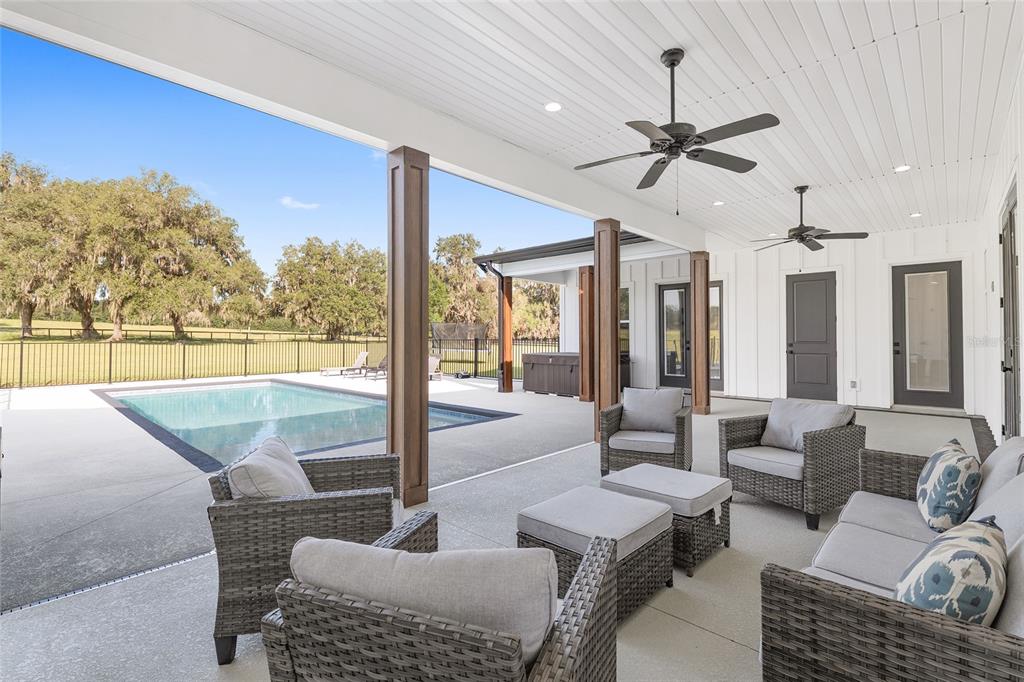 15224 Northwest 56th Court Road Reddick, FL 32686 - Photo 44 of 50 a living room with furniture and a large window