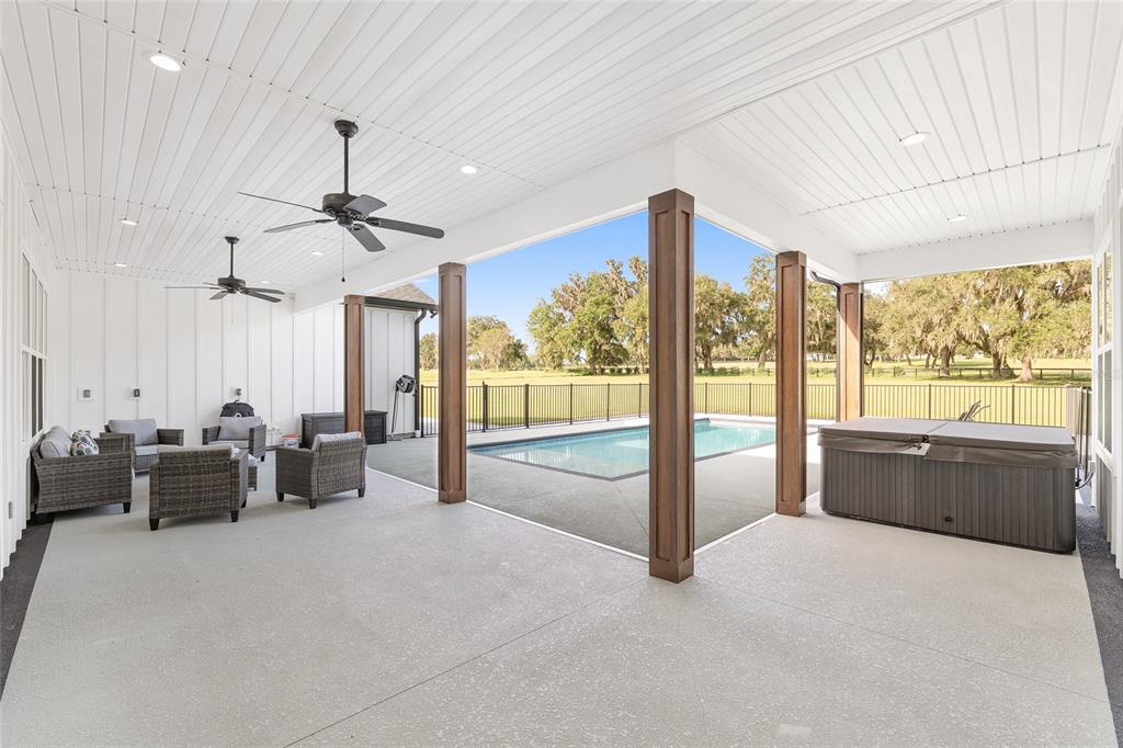 15224 Northwest 56th Court Road Reddick, FL 32686 - Photo 46 of 50 a large room with a large window and furniture