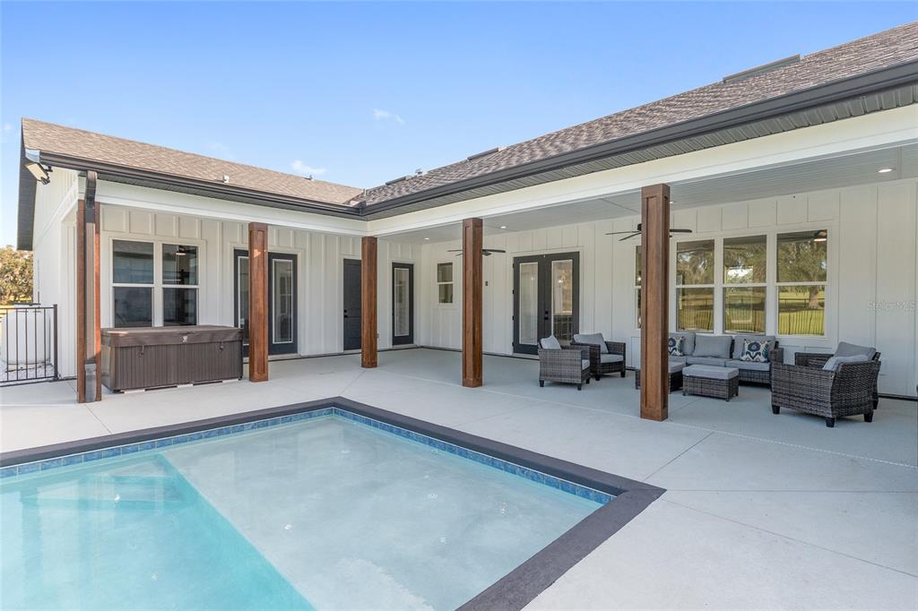 15224 Northwest 56th Court Road Reddick, FL 32686 - Photo 48 of 50 a view of a livingroom with couch and a couch