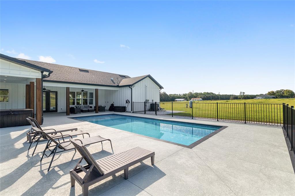 15224 Northwest 56th Court Road Reddick, FL 32686 - Photo 49 of 50 swimming pool view with a outdoor seating space
