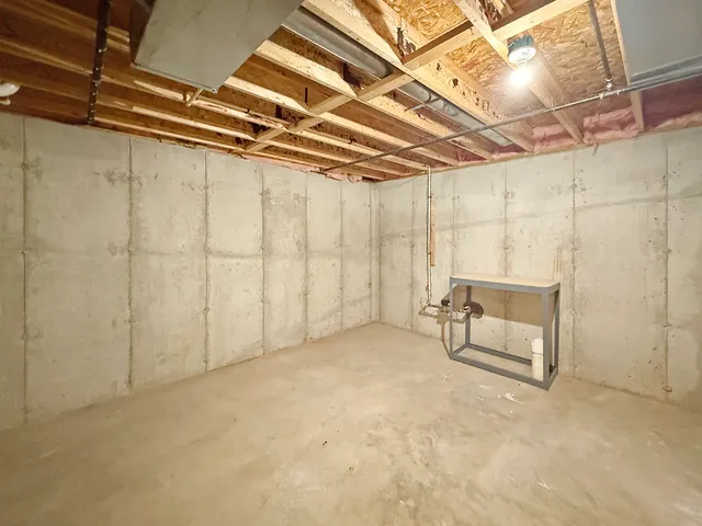 a front view of house with a garden