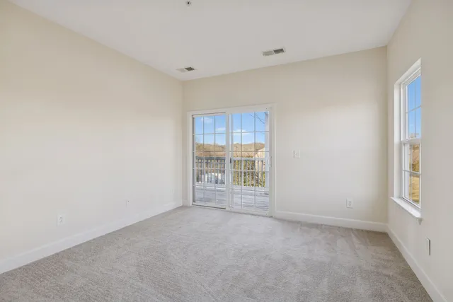 a view of an empty room with window