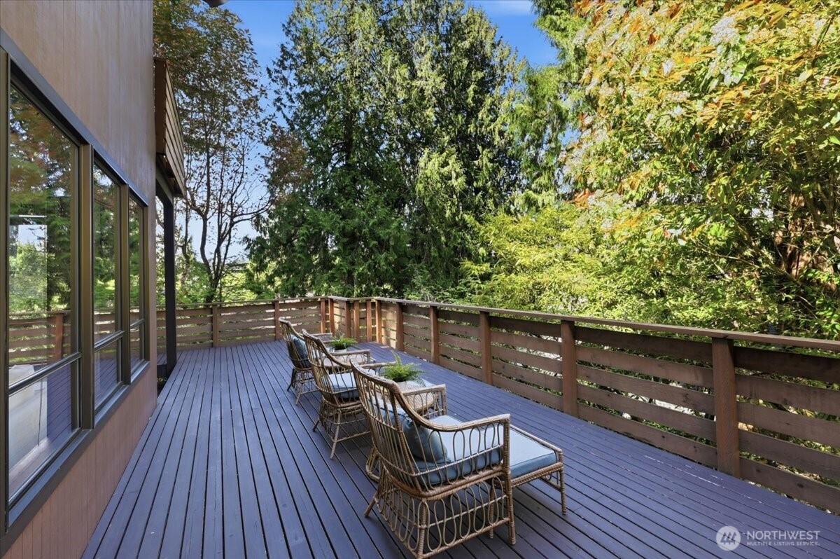 9418 Odin Way Bothell, WA 98011 - Photo 31 of 39 a view of balcony with wooden floor and outdoor seating