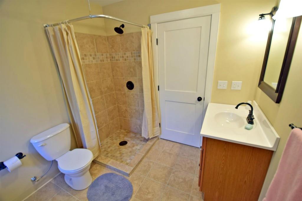 213 Tannery Brook Road Ellsworth, ME 04605 - Photo 19 of 35 Lovely tiled shower.