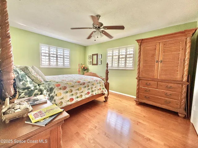 a bed room with furniture and a window
