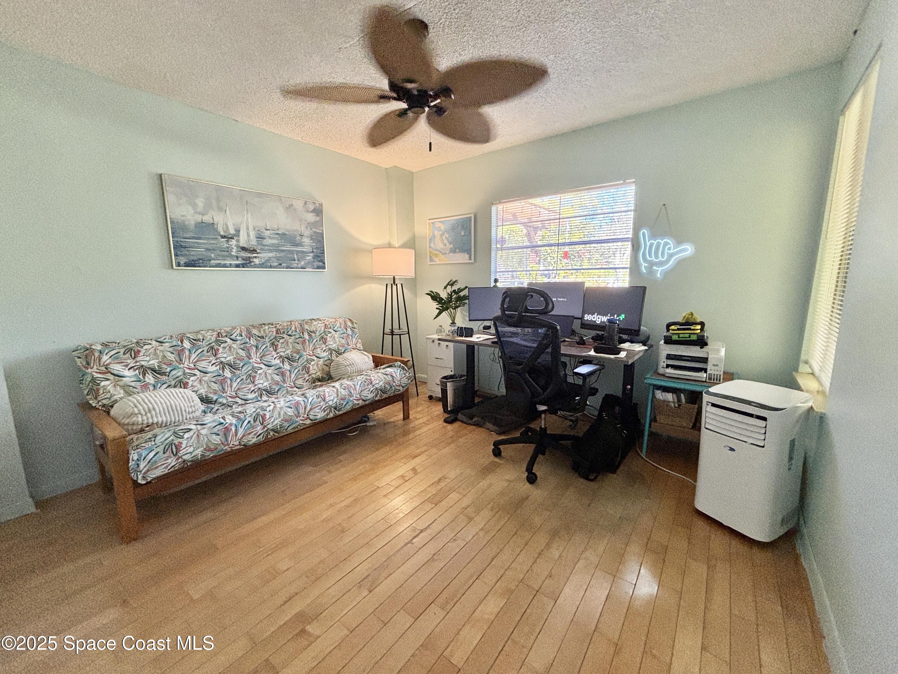 3955 Fooshe Avenue Sebastian, FL 32976 - Photo 22 of 45 a bed room with furniture and a window