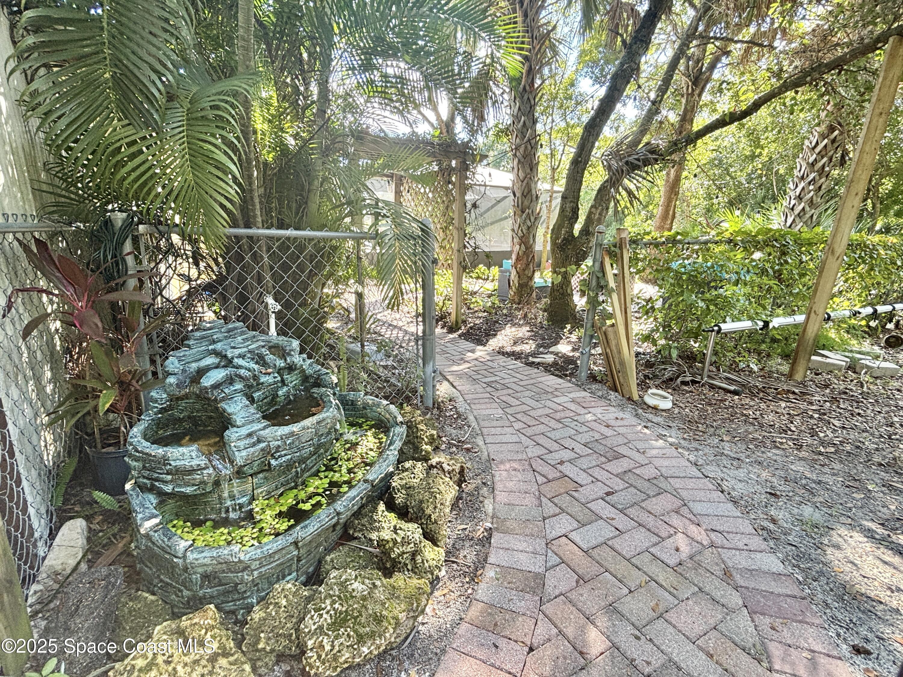 3955 Fooshe Avenue Sebastian, FL 32976 - Photo 35 of 45 a view of a garden with plants