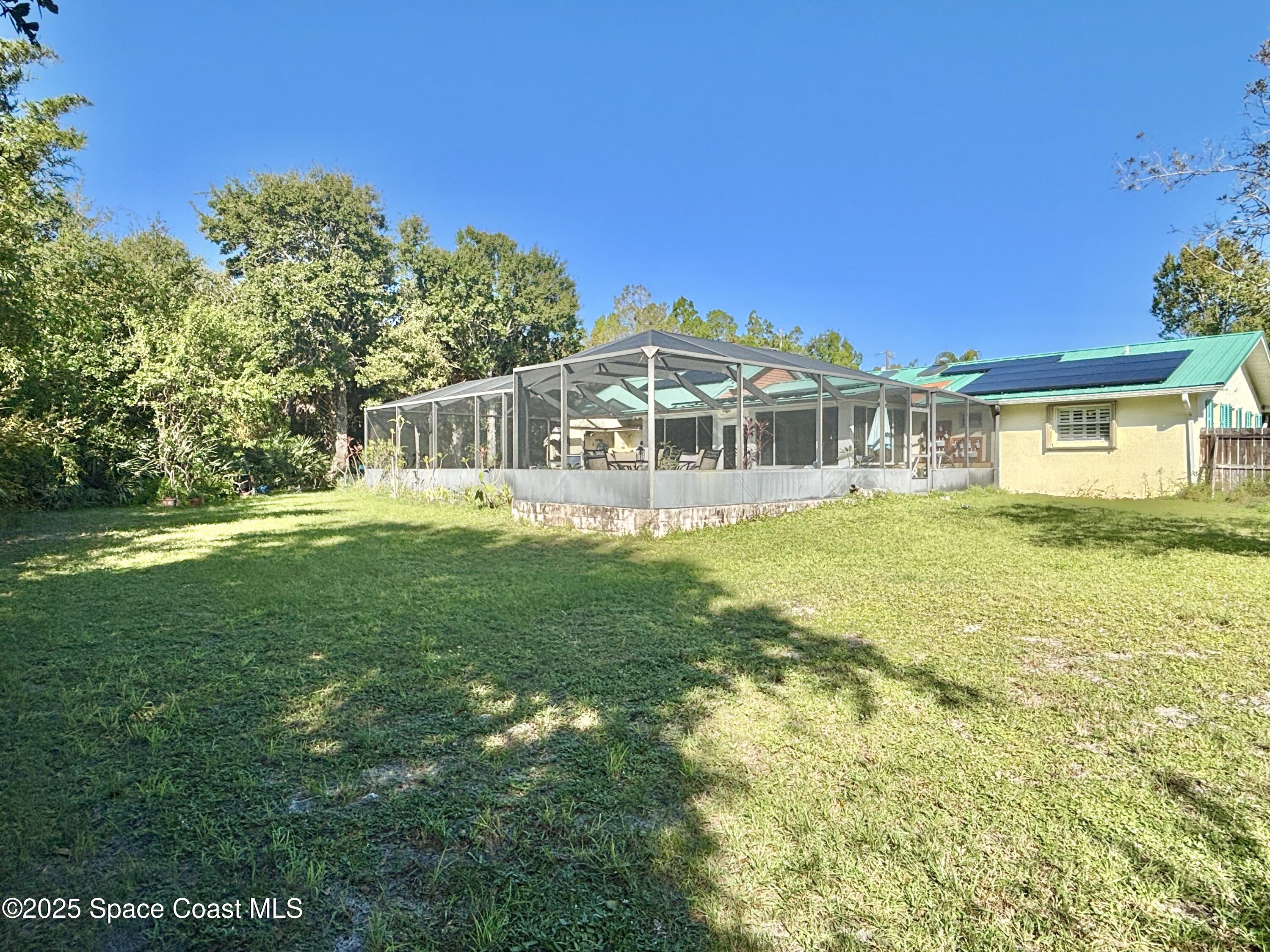 3955 Fooshe Avenue Sebastian, FL 32976 - Photo 6 of 45 a view of a house with a big yard