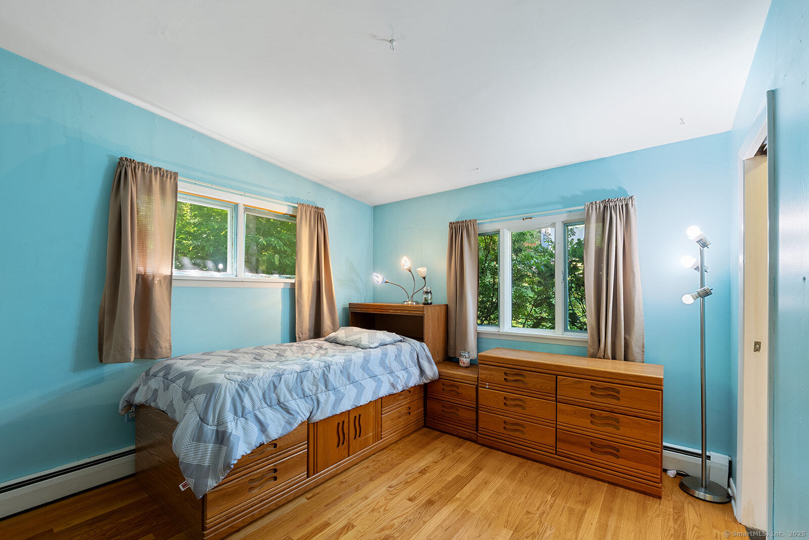26 Wilridge Road Ridgefield, CT 06877 - Photo 32 of 40 a bedroom with a bed and a large window