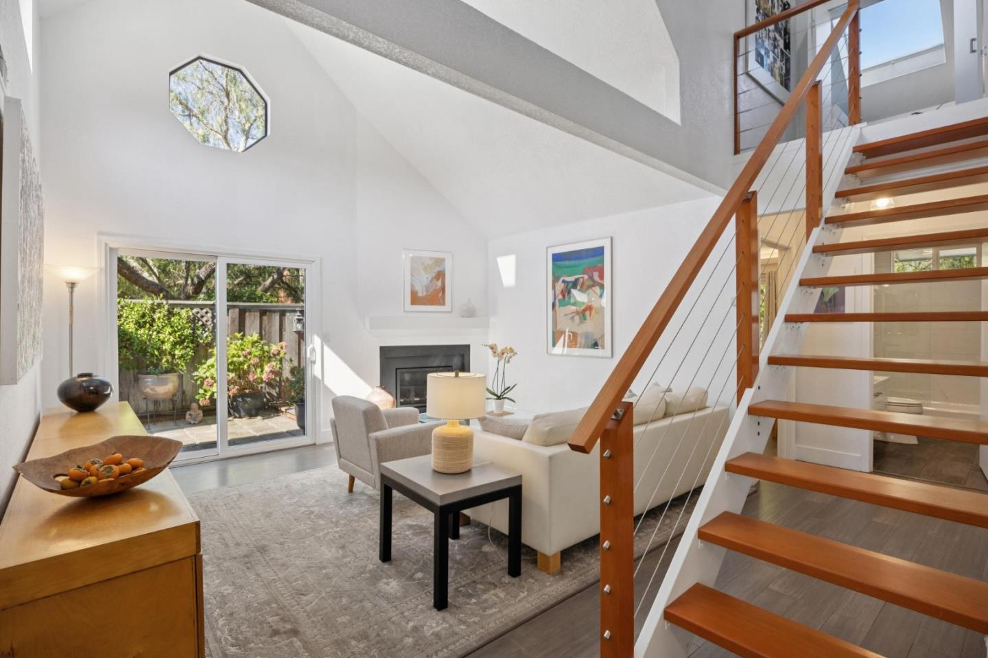 2601 Mallory Lane Santa Cruz, CA 95065 - Photo 21 of 52 a living room with furniture and a floor to ceiling window