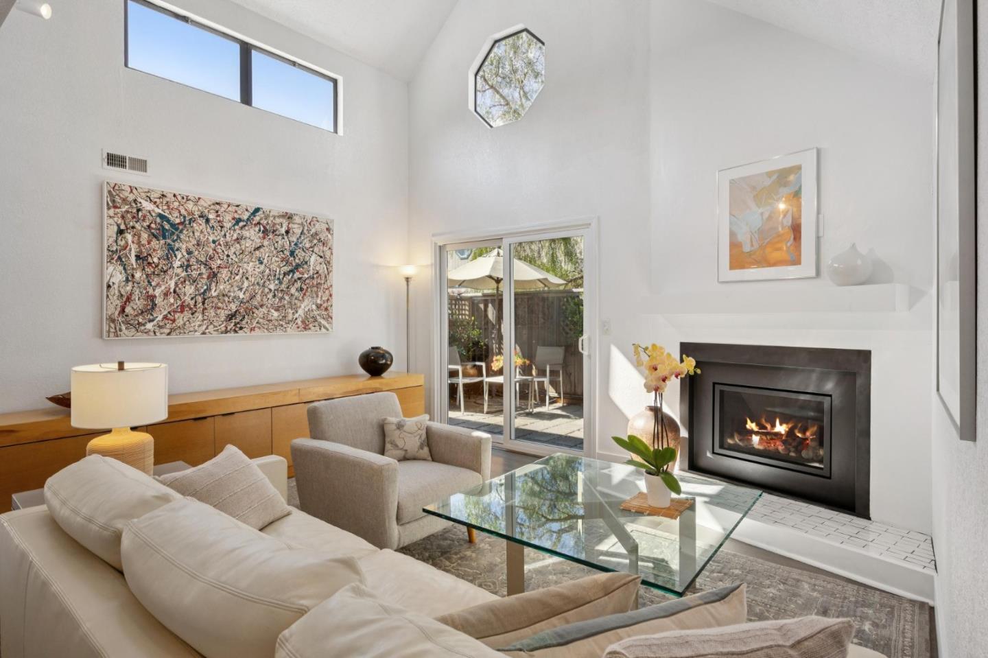 2601 Mallory Lane Santa Cruz, CA 95065 - Photo 25 of 52 a living room with furniture a flat screen tv and a fireplace