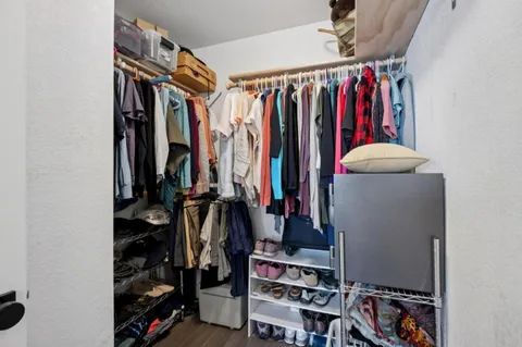 a bath room with a sink and a mirror