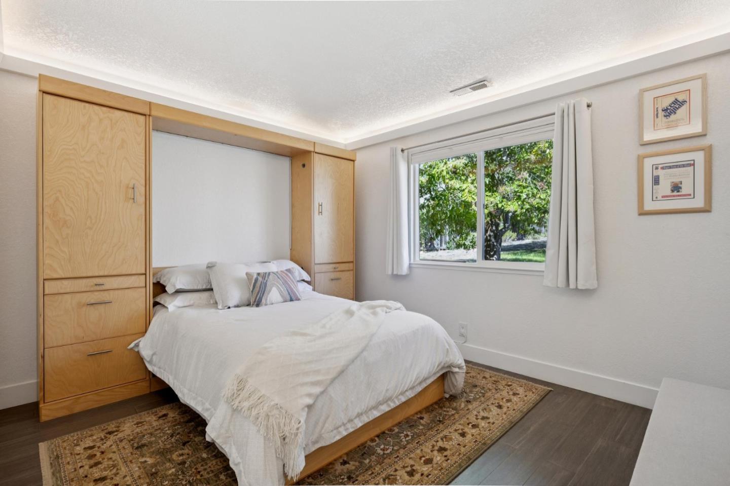 2601 Mallory Lane Santa Cruz, CA 95065 - Photo 36 of 52 a bedroom with a bed and a window