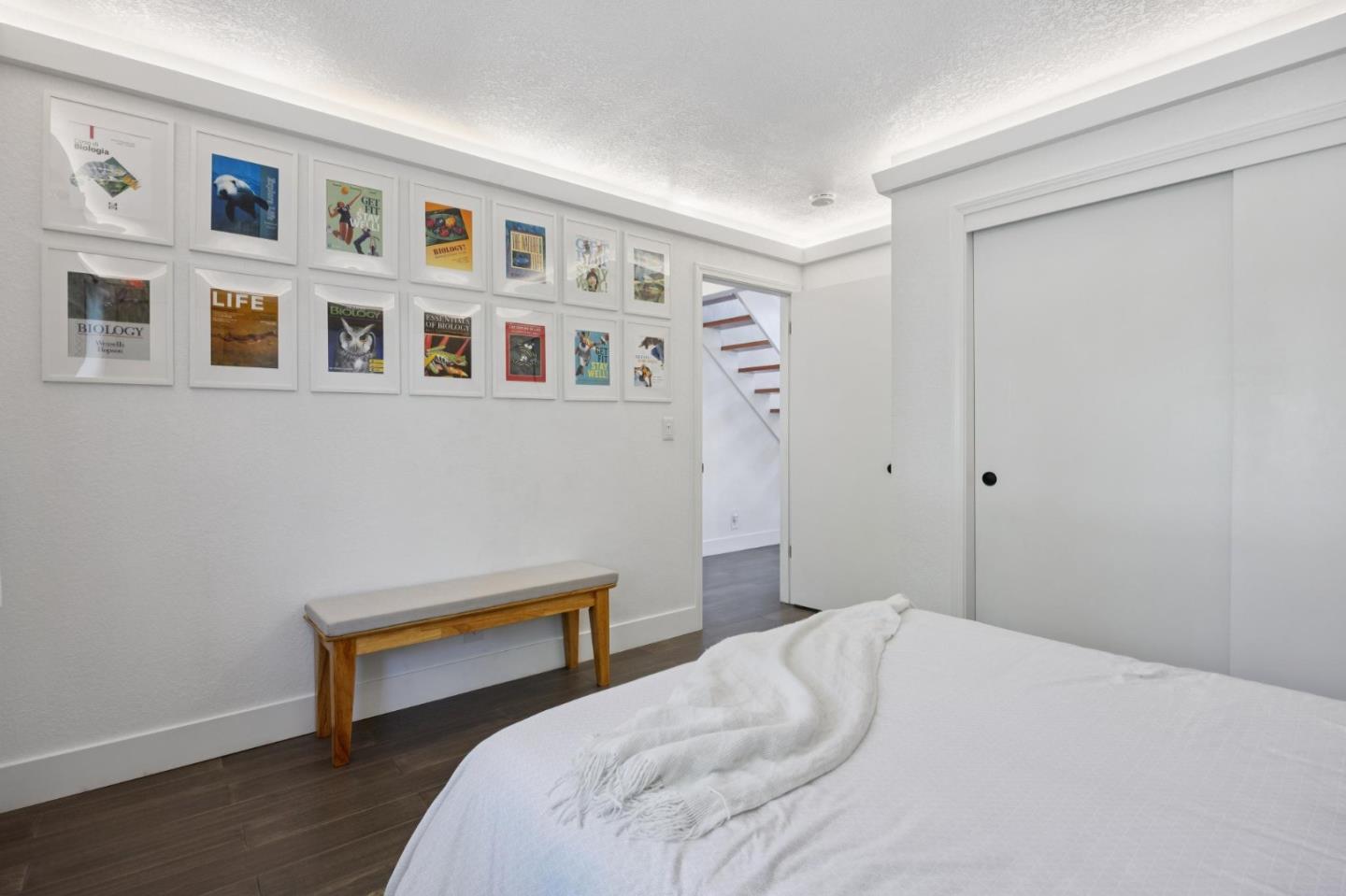 2601 Mallory Lane Santa Cruz, CA 95065 - Photo 37 of 52 a bedroom with a bed and a wall painting