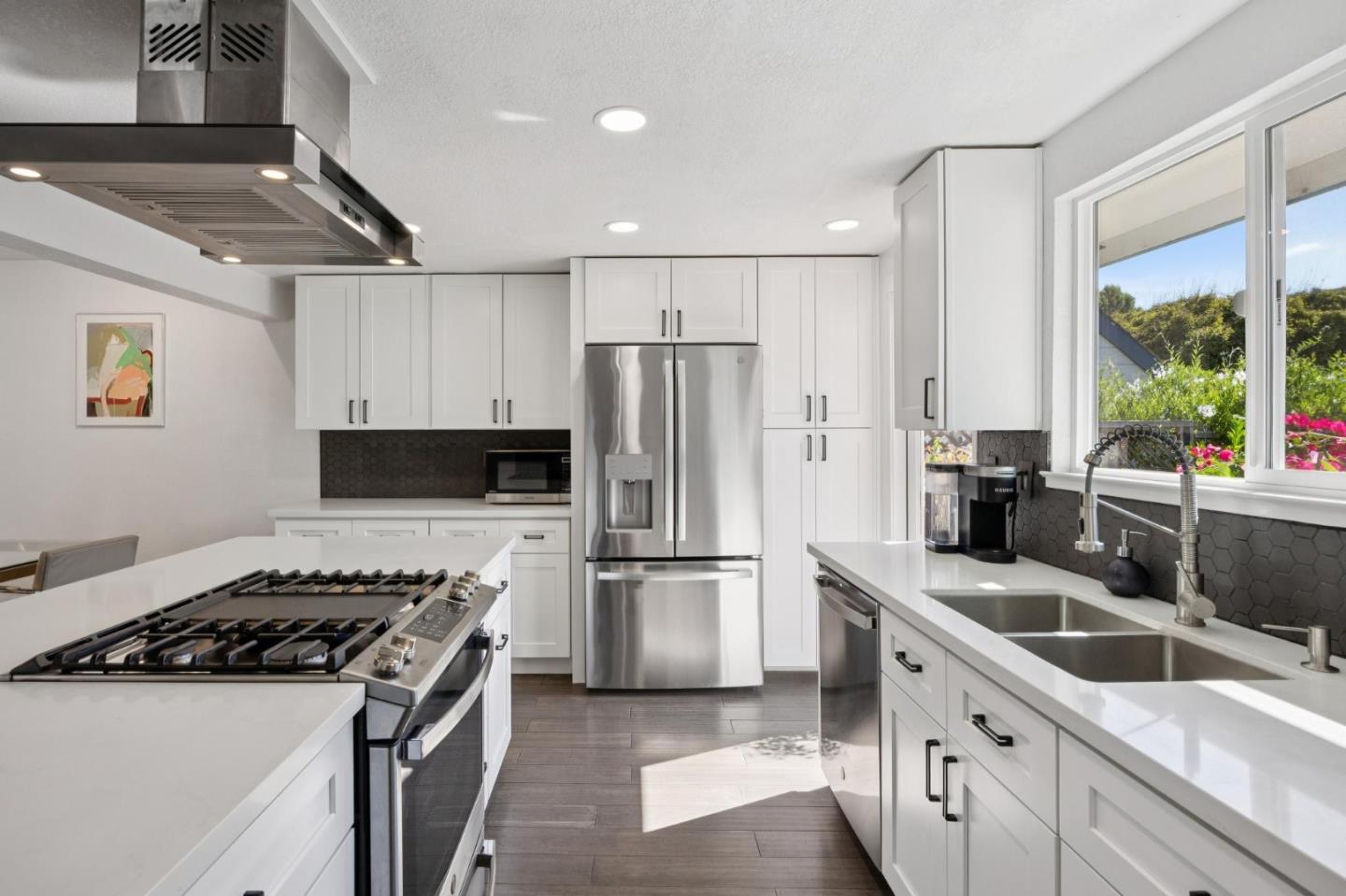 2601 Mallory Lane Santa Cruz, CA 95065 - Photo 10 of 52 a kitchen with stainless steel appliances a sink a stove a refrigerator cabinets and a window