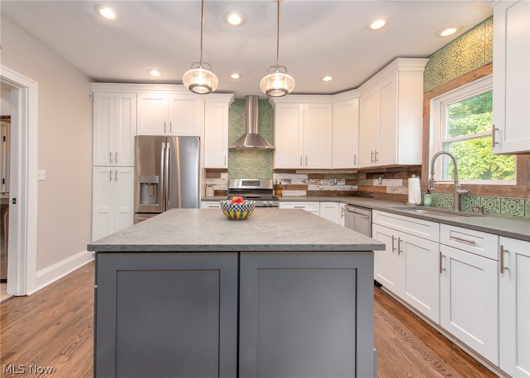 3265 Kenmore Road Shaker Heights, OH 44122 - Photo 6 of 26 Hello lovely! This 2019 kitchen renovation puts the fun in functional. Quartz counters, new appliances, recessed lighting and storage galore.